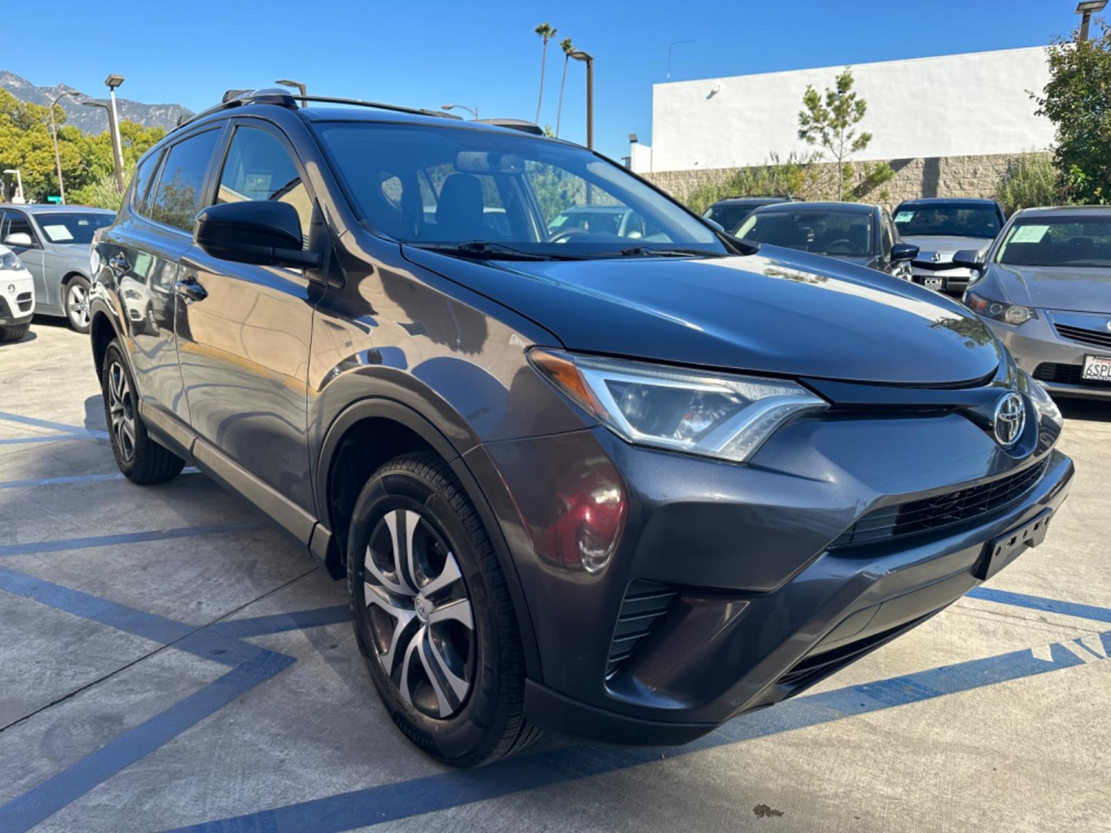 2016 Gray /Black Toyota RAV4 (JTMZFREVXGJ) , AUTOMATIC transmission, located at 30 S. Berkeley Avenue, Pasadena, CA, 91107, (626) 248-7567, 34.145447, -118.109398 - Crown City Motors is a used “Buy Here Pay Here” car dealer in Pasadena CA. “Buy Here Pay Here” financing, means that when you purchase your vehicle from our dealership, that you make the payments to the dealership as well. We do not need the banks approval to get you approved for a used auto - Photo #7
